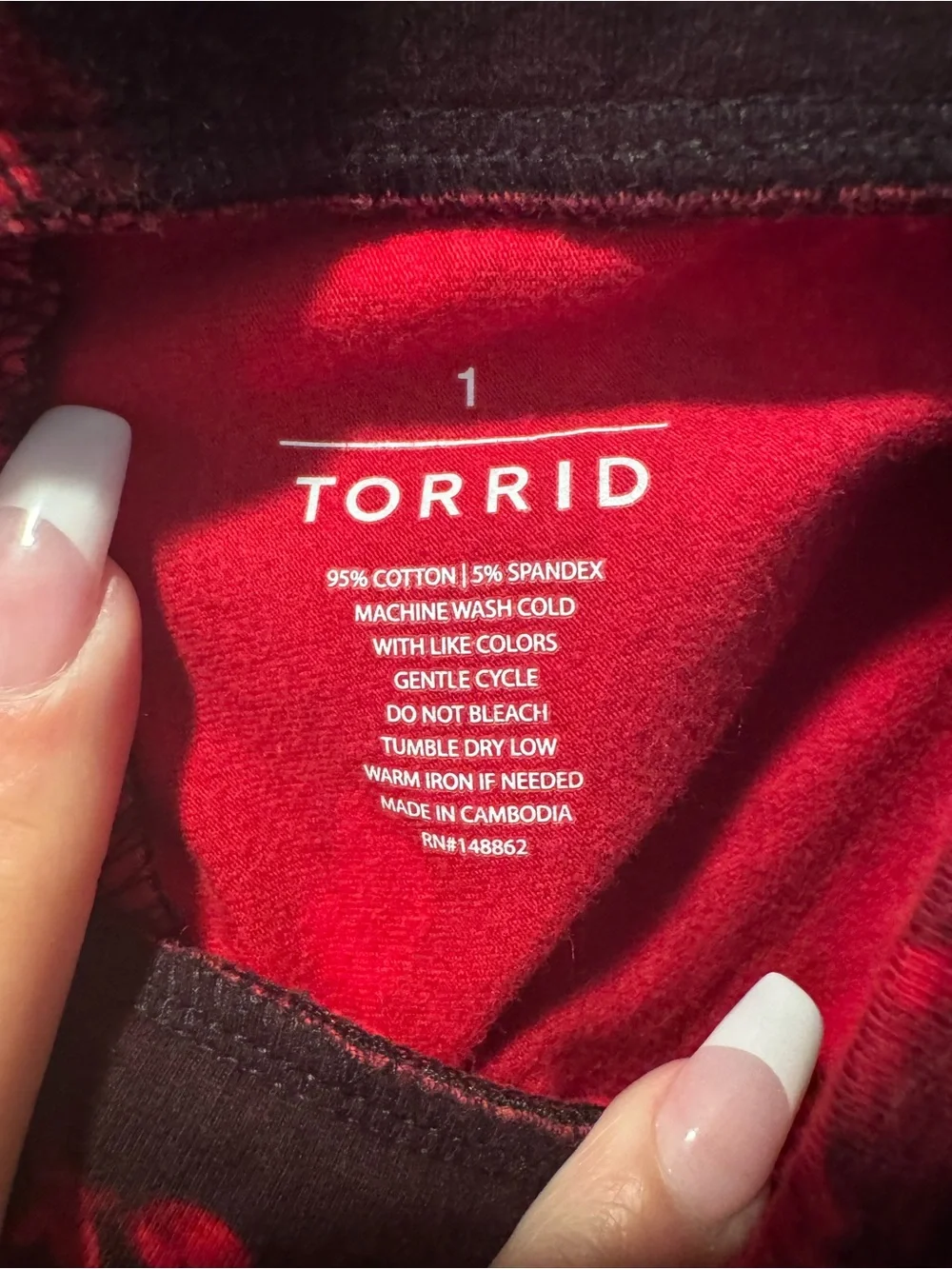 Torrid Black Leggings with Red Floral Print